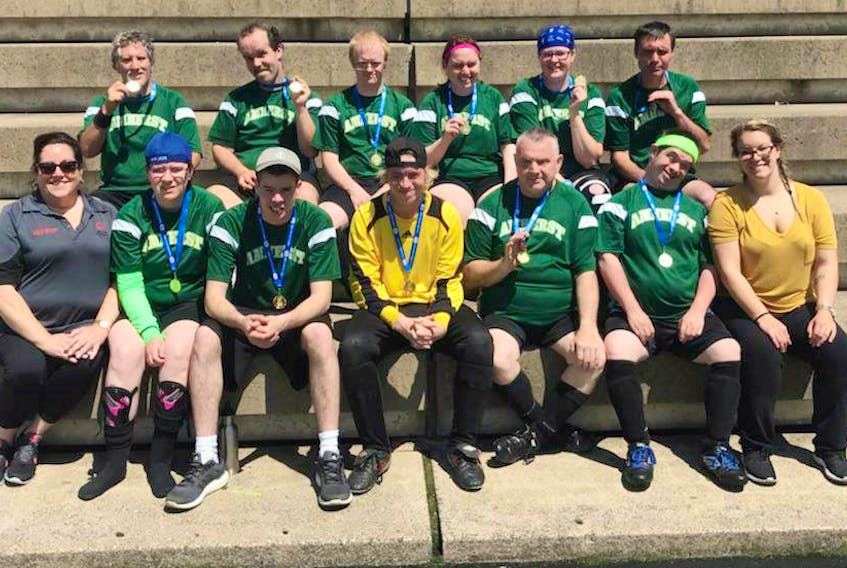 The Amherst Coyotes won the gold medal in soccer at the Nova Scotia Special Olympics in Halifax last weekend. Members of the team include: (front, from left) coach Lisa Hines, Allison Borden, co-captain Brandon Ott, Jacob Fisher, Tim Bird, Ryan Mootrey, coach Acacia Dunphy, (back, from left) Cory Hansen, Jesse Williams, Robert Babineau, Rebecca Sprague, Robyn Munro and co-captain Terry Black.