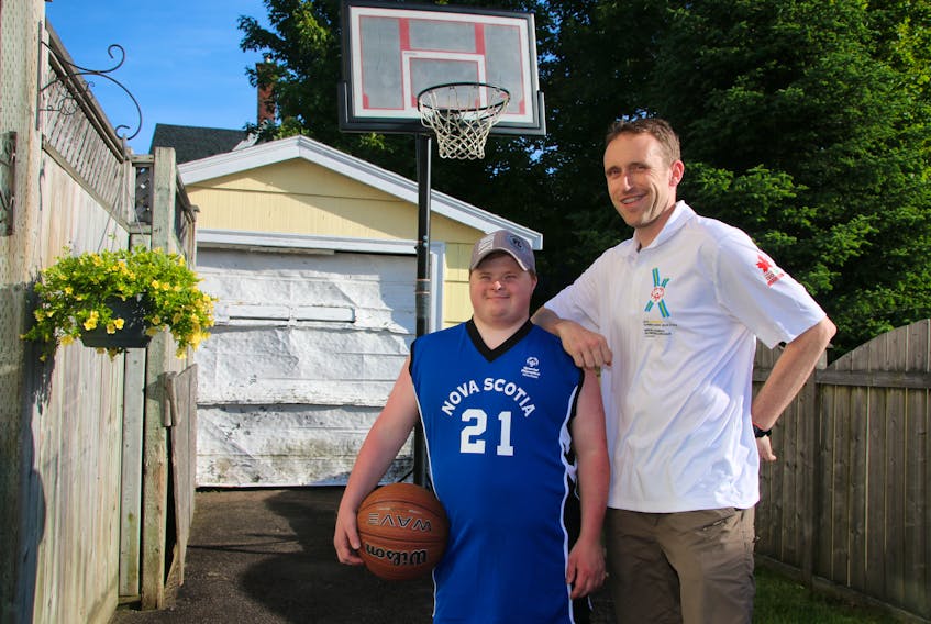 Marc MacNevin and coach Jason Crewe are looking forward to taking part in the national Special Olympics this summer. Marc has been a member of the Cobequid Special Olympics basketball team for six years.