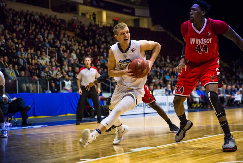 Gurad Tyler Haws (left), shown in a game against Damontre Harris (44) and the Windsor Express in a National Basketball League of Canada game earlier this month at Mile One Centre, has been released by the St. John's Edge. — St. John's Edge photo/Jeff Parsons