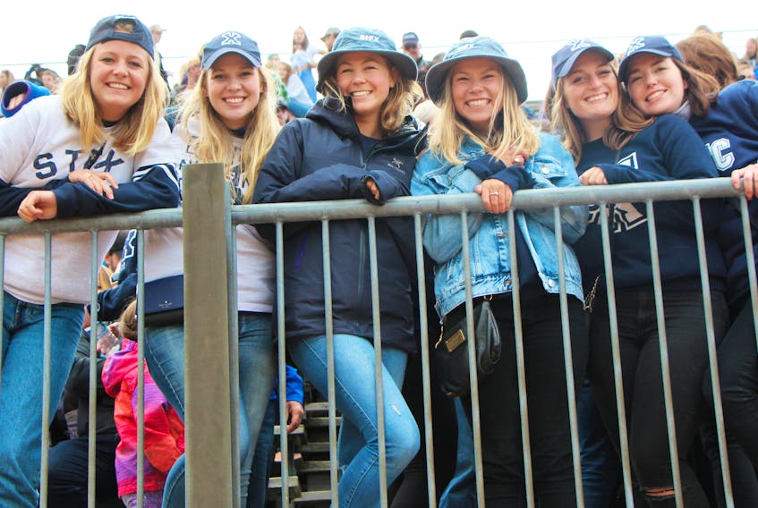 Students display their St. F.X. spirit during last year’s Homecoming football game. This year, the X-Men will tangle with bitter rival, the St. Mary’s Huskies, during Homecoming Saturday, Sept. 29.