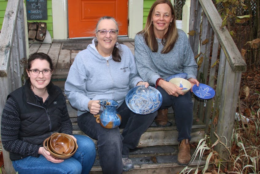 Painting and pottery students will be displaying some of their work at the Marigold Cultural Centre in December. Three of the people taking part are, from left, Chantal Paupin, Jane Maddin and Catherine MacLean.