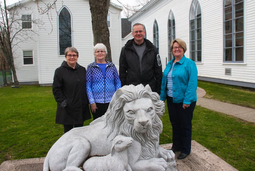 Organizing committee members; Judi MacPherson, Isabelle Tate, Rev. Peter Smith and Joanne Clifton, gather for a photo outside of St. James United Church which will host its annual spring celebration – the Stump Frolic – this Saturday.