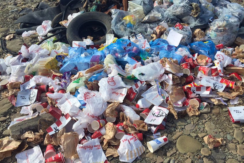 The pile of garbage - full of KFC and Tim Hortons debris - dumped at Bridgeport Beach less than two hours after 50 people worked on a cleanup of the beach.