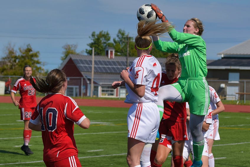Memorial Sea-Hawks goalkeeper Sydney Walsh goes high to snag the ball in an Atlantic University Sport women’s soccer game against the Acadia Axewomen in Wolfville, N.S., last season. Walsh, a first-team AUS all-star in 2018-19, is being counted on to help Memorial back into the conference playoffs as the Sea-Hawks open a new schedule today at King George V Park in St. John’s, where they take on the Saint Mary’s Huskies at 1 p.m. — Submitted via Memorial Athletics.