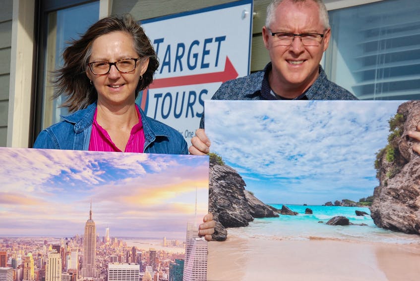 Lynn and John Dunphy have seen business more than double since 2014 for their tour company called Target Tours. The couple pose outside their new location in Stratford that follows years of operating out of their basement in Morell. JIM DAY/THE GUARDIAN