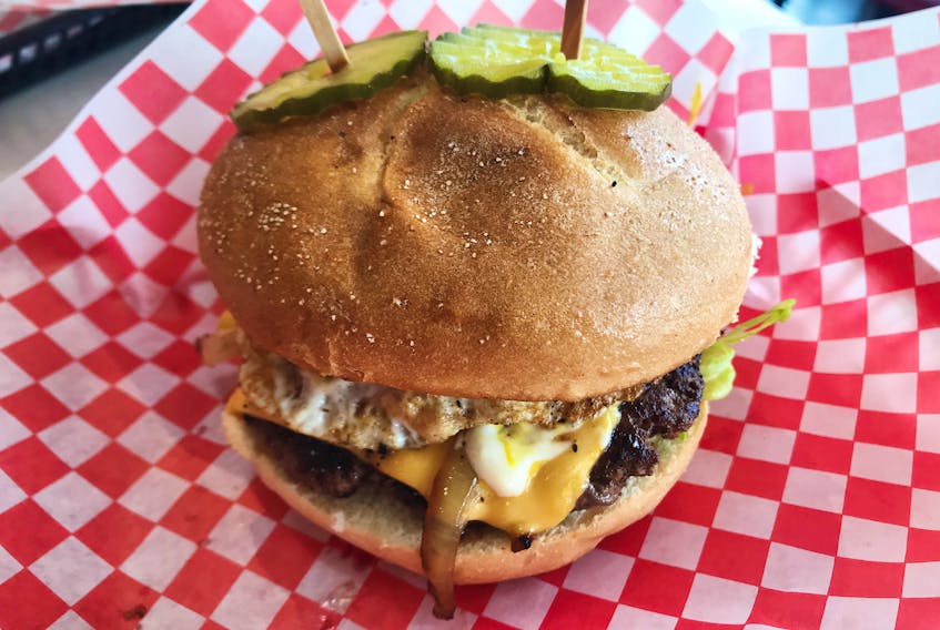 Charger Burger is a fast food-style restaurant in Woodside specializing in poutine, chicken fingers, chicken burgers, and beef burgers. I loved the option of adding a fried egg to my cheeseburger. -Kelly Neil