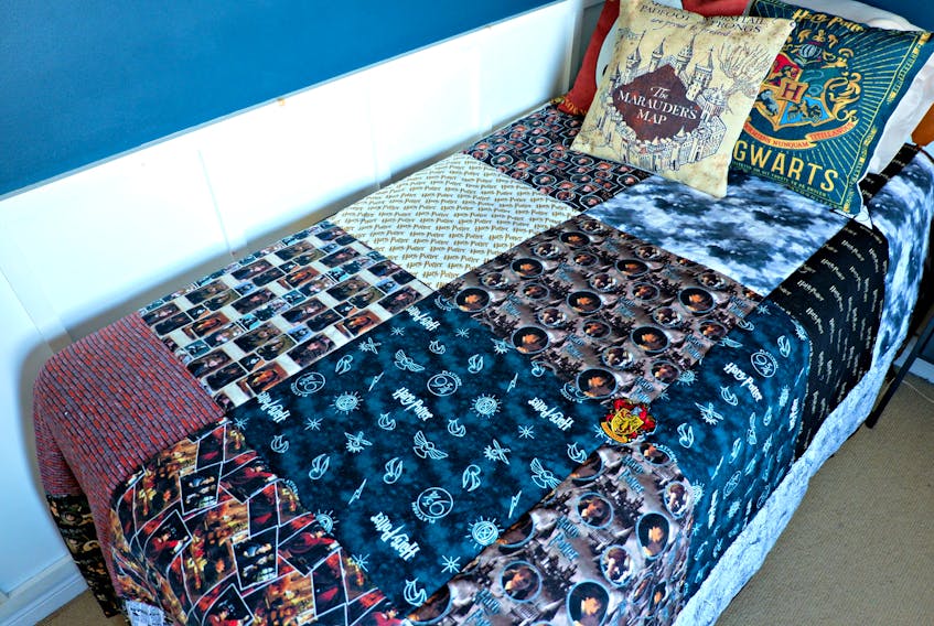 Heather sewed her son a gigantic Harry Potter quilt from 13 different fabrics.