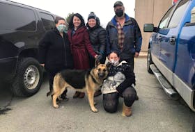 From left: Teresa Brown, Jasper the German Shepherd, Nicole Pearson-Nearing, Nicole Saccary, Rebecca Brown and Kirk Bazley. Jasper was reunited with his family on Monday after going missing for seven months and travelling an estimated 250-kilometre stretch in Nova Scotia in that time.