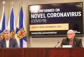 Premier Stephen McNeil and Dr. Robert Strang, chief medical officer of health, speak to the media during a COVID-19 teleconference Friday in Halifax.