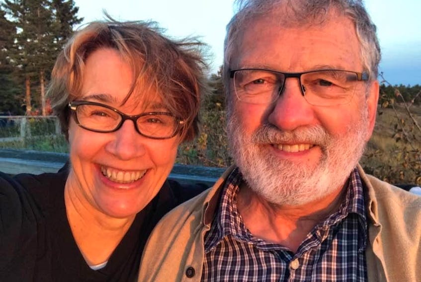 Spouses Catherine Cervin and David Gass smile for a selfie. - Contributed