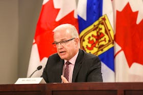 Justice Minister Mark Furey answers a question after an announcement on Thursday, July 23, 2020, of a joint independent review into the mass shooting on April 18 and 19.