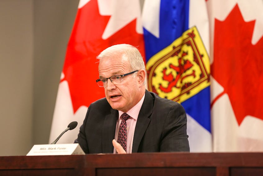 Justice Minister Mark Furey answers a question after an announcement on Thursday, July 23, 2020, of a joint independent review into the mass shooting on April 18 and 19.