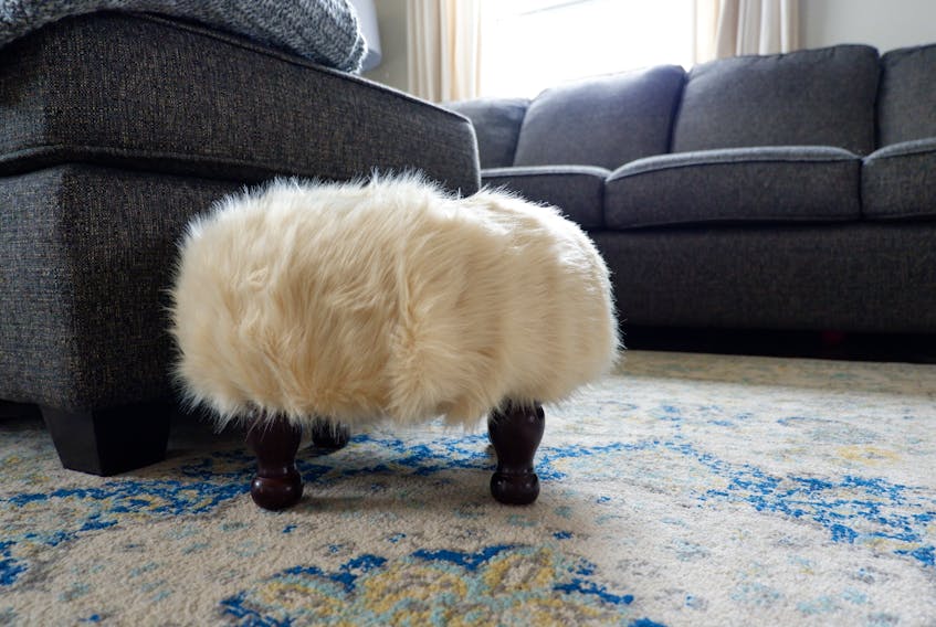 Heather’s new DIY fur pouf adds a nice wintery touch to her living room.