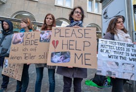 Farmers must find a way to bridge the rural/urban divide to convince consumers they treat their animals ethically, says Sylvain Charlebois. People all over the world, such as these protesters in Zurich, Switzerland, have taken part in street demonstrations against the killing of farm animals.