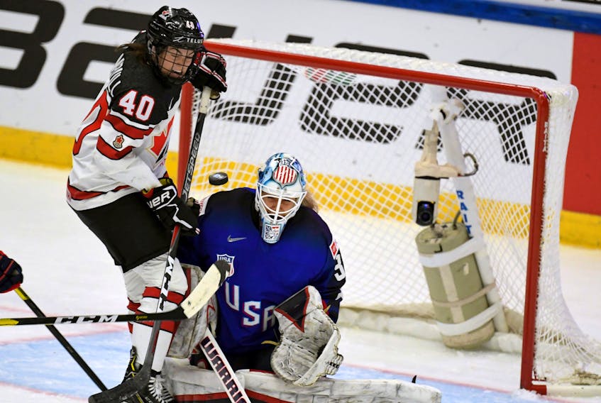 Canada’s Blayre Turnbull of Stellarton tries to deflect a puck against U.S. goalie Alex Rigsby during action at the 2019 world women’s hockey championship in Espoo, Finland, last year. The 2020 women’s world championships scheduled to be held March 31-April 10 in Halifax and Truro is still scheduled despite the fact the International Ice Hockey Federation cancelled six other world championships on Monday. REUTERS
