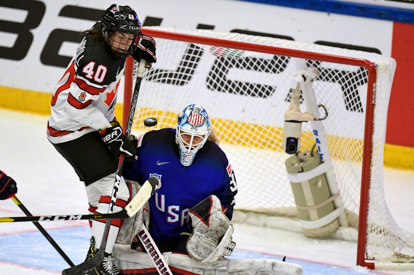 Canada’s Blayre Turnbull of Stellarton tries to deflect a puck against U.S. goalie Alex Rigsby during action at the 2019 world women’s hockey championship in Espoo, Finland, last year. The 2020 women’s world championships scheduled to be held March 31-April 10 in Halifax and Truro is still scheduled despite the fact the International Ice Hockey Federation cancelled six other world championships on Monday. REUTERS