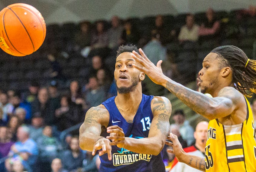 Halifax Hurricanes; Joel Kindred makes a pass against London Lightning's AJ Gaines during NBL Canada action on Sunday in London, Ont. Kindred scored 37 points in the Hurricanes' loss. Mike Hensen / London Free Press
