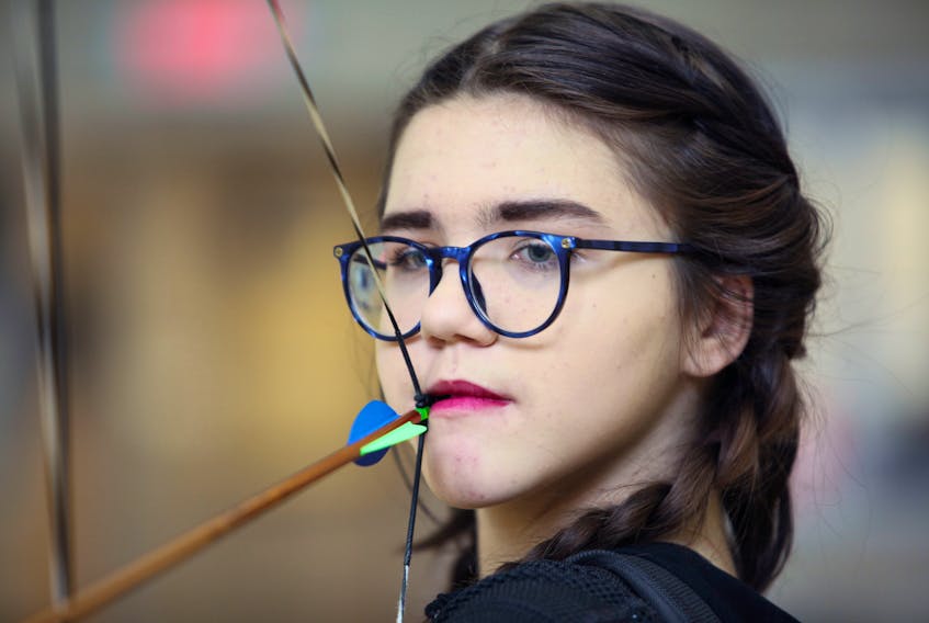Gabrielle Goodland bites down on her mouth release as she practices archery in the gym of Ecole Secondaire du Sommet. The 15-year-old archer has limited use of her right arm and is partially blind in her left eye. The challenges hasn’t stopped the plucky teenager as she gets ready for the 2024 Paralympics.
ERIC WYNNE/Chronicle Herald
