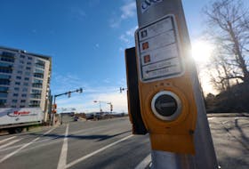 A pedestrian push-button is seen at the corner of Alderney Drive and King Street in Dartmouth. Halifax Regional Municipality says it will soon be 
making adjustments to traffic signal programming at many locations to remove the requirement for pedestrians to press a button to activate the pedestrian signal between the hours of 6 a.m. and midnight — a requirement that’s been cause for public criticism in recent months.