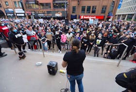 Thousands of participants listen to Sharisha Benedict speak at an event along Spring Garden Road in Halifax Monday night, June 1, 2020. The event was held in solidarity to peaceful rallies held in the United States protesting the death of George Floyd last week by a Minneapolis police officer who knelt on the man’s neck.