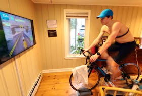 Dec. 13, 2020—Callum Myers, 17, at his home in Dartmouth as he participates in a virtual bike race to race money for Feed Nova Scotia. The ride was done through ZWIFT an online portal so other rides can join from any location in the world.
ERIC WYNNE/Chronicle Herald