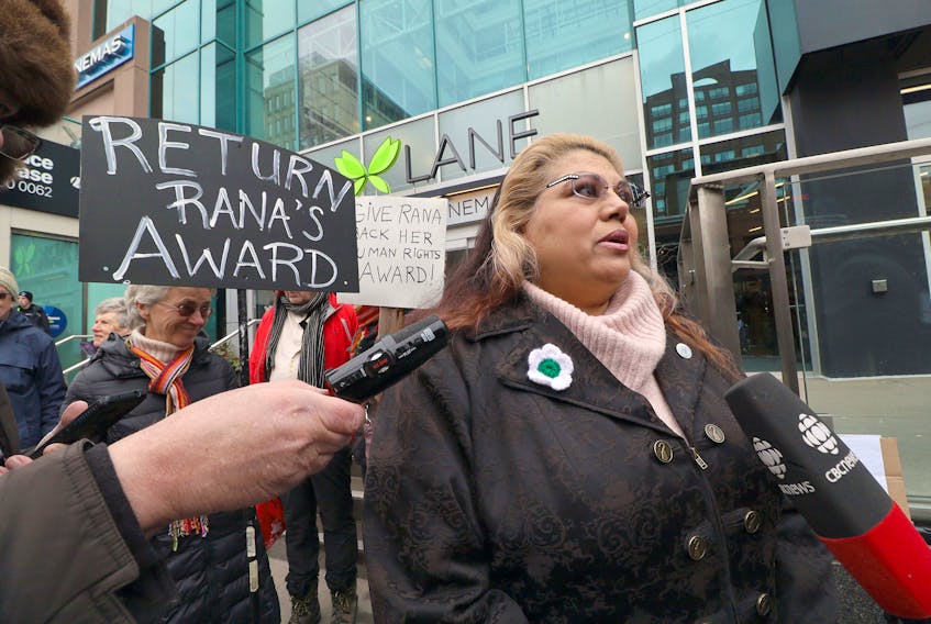Rana Zaman talks to the media on the sidewalk outside Park Lane Monday, Dec. 23, 2019. About 30 people stood outside Park Lane, offices of the Nova Scotia Human Rights Commission, to support Rana Zaman. On December 10, the Nova Scotia Human Rights Commission (HRC) awarded social activist Rana Zaman the prestigious “Individual Human Rights Award” at a ceremony at the Halifax Central Library. Ten days later the HRC rescinded Zaman’s award due to comments she made comparing Israeli actions to those of the Nazis.