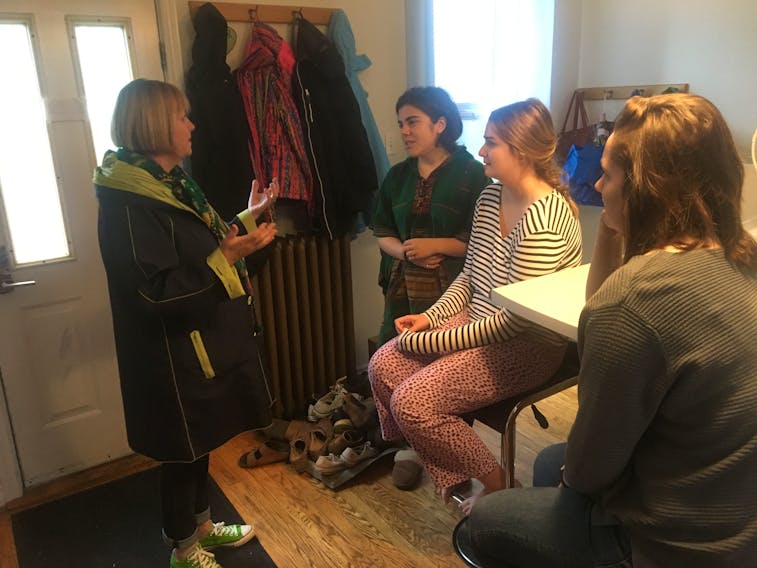 Jo-Ann Roberts, the Green Party of Canada candidate in Halifax, talks to some Dalhousie University students on the campaign trail on Wednesday.