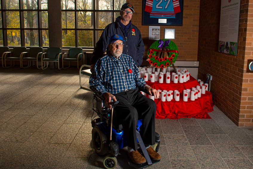 Jack Whitehead, front, and his son, Ken, seen here at the Camp Hill Veterans' Memorial Building on Nov. 6 have a combined 71 years of military service.
