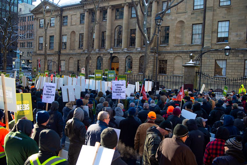 Hundreds of forestry workers and supporters are gather for a rally outside of Province House on Thursday, Dec. 19, 2019. Northern Pulp says it will shut down its Pictou Country mill if the government doesn't extend the Boat Harbour Act deadline.