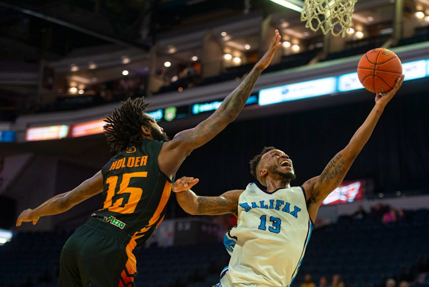 Halifax Hurricanes guard Joel Kindred drives to the hoop against Sudbury Five forward Jarius Holder during Thursday nights NBL Canada game at the Scotiabank Centre. The Five beat the Hurricanes 158-141.