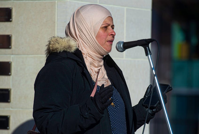 Sura Hadad speaks at a Victims of War Rally organized by March On Halifax at Grand Parade on Saturday, Jan. 18, 2020.