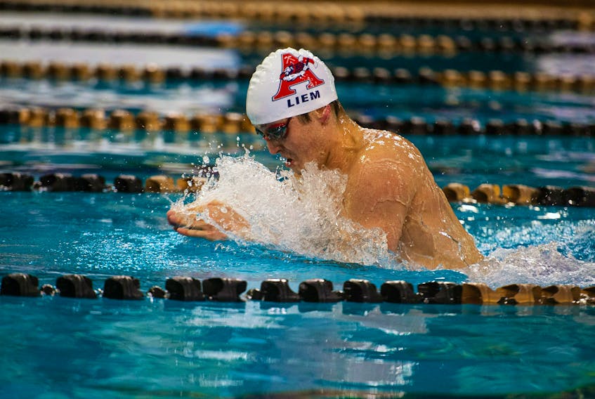 Acadia's Brett Liem swims in the men's 100-metre breaststroke heats at the   AUS swimming championships at the Dalplex on Friday. The Axemen end a 38-year title drought on Sunday bu outpointing the Dalhousie Tigers. Ryan Taplin - The Chronicle Herald