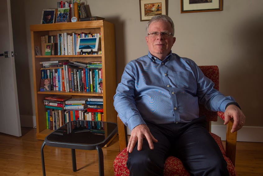 Brian Duggan, author of Coaching From the Inside Out: A Personal Approach to Coaching For Change, poses for a photo at his Halifax home on Thursday, February 6, 2020.