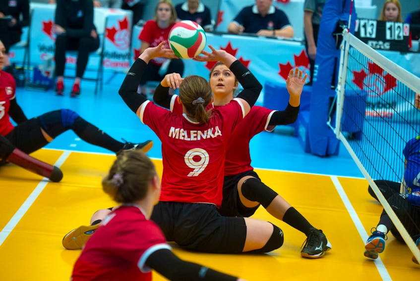 Team Canada's Sarah Melenka celebrates winning the first set against Slovenia during the opening match of the women's sitting volleyball Paralympic 2020 Tokyo qualification tournament at the Canada Games Centre on Wednesday.  Ryan Taplin - The Chronicle Herald