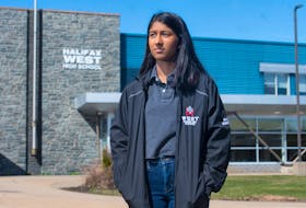 Sapna Natarajan, a Grade 12 student at Halifax West, poses for a photo outside her school on Thursday, April 30, 2020.