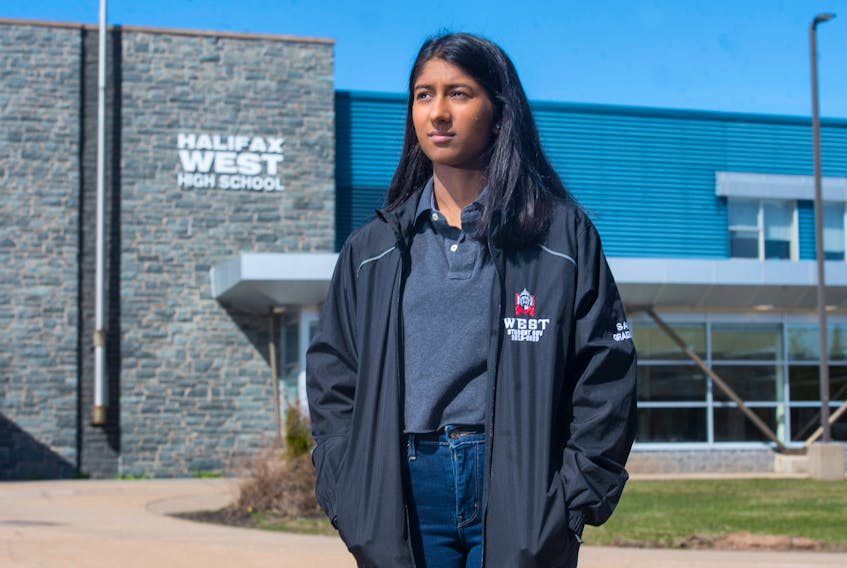 Sapna Natarajan, a Grade 12 student at Halifax West, poses for a photo outside her school on Thursday, April 30, 2020.