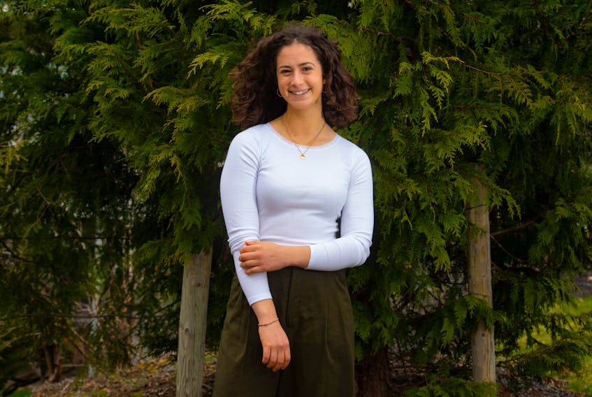 Rebeccah Raphael poses for a photo outside her Halifax home on Friday, May 1, 2020. Raphael, and other tutors, are volunteering their time to help elementary-age students during the COVID-19 crisis.