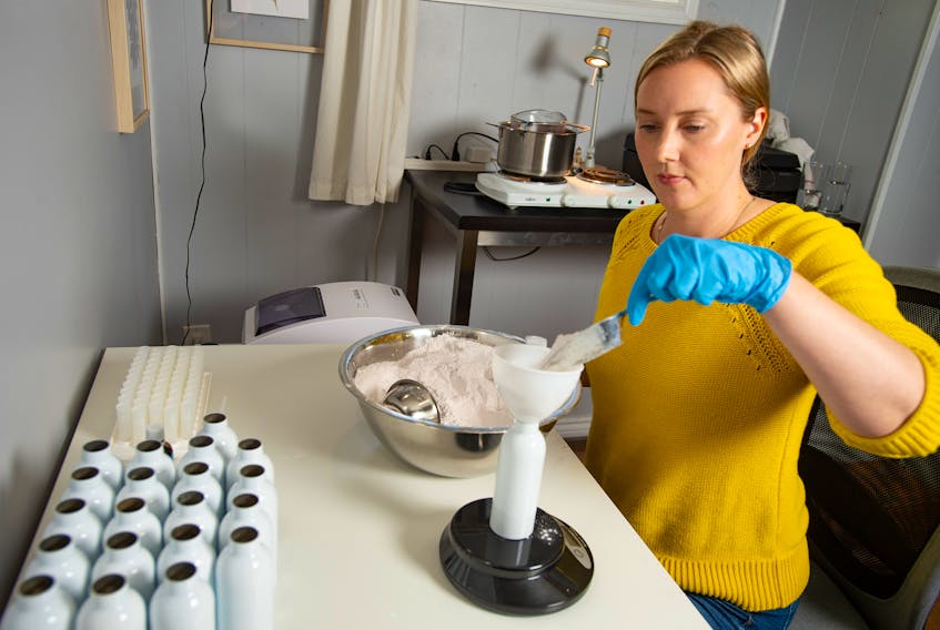 Alison Brown Dolmont, owner of Olga Designs makes some baby powder at her home-based business in Dartmouth. Some of Brown Dolmont's products will be featured in the Community Haul subscription box.