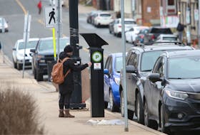FOR NEWS STORY:
A woman uses a parking kiosk on Queen Street Halifax Wednesday January 6, 2020.. 

TIM KROCHAK PHOTO