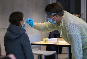 FOR NEWS STORY:
A student undergoes a swab test, during free pop up COVID-19 testing site in the Ricard Murray Design Building in Halifax Tuesday November 24, 2020. Hundreds of students lined up for the rapid tests.
TIM KROCHAK PHOTO