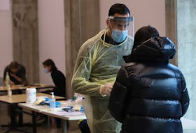 FOR NEWS STORY:
A medical technician asks a student some questions before they were to conduct free COVID-19 testing at a pop up testing site in the Richard Murray Design Building in Halifax Tuesday November 24, 2020.  Hundreds of students lined up for the free rapid test.
TIM KROCHAK PHOTO
