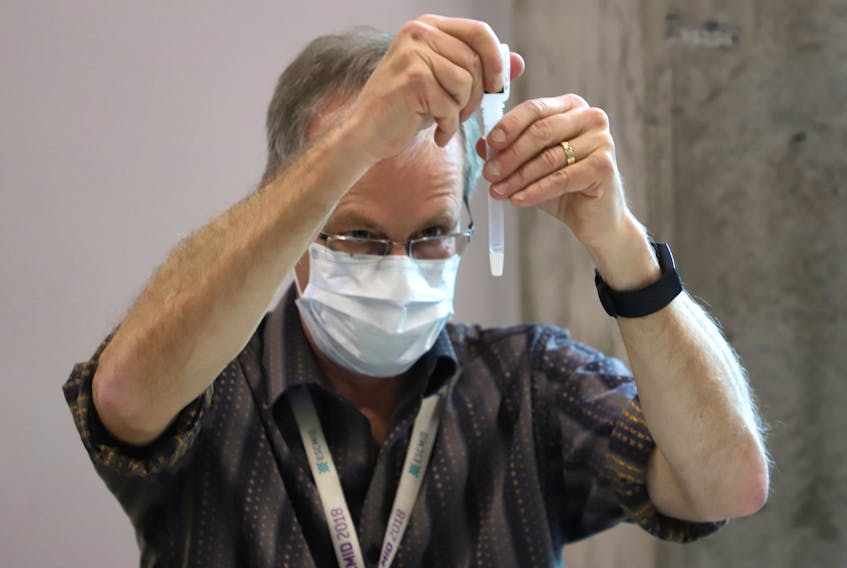 FOR NEWS STORY:
A medical technician prepares a rapid COVID-19 test sample, at a pop-up testing site in the Richard Murray Design Building in Halifax Tuesday November 24, 2020. Hundreds of students lined up for rapid testing.
TIM KROCHAK PHOTO