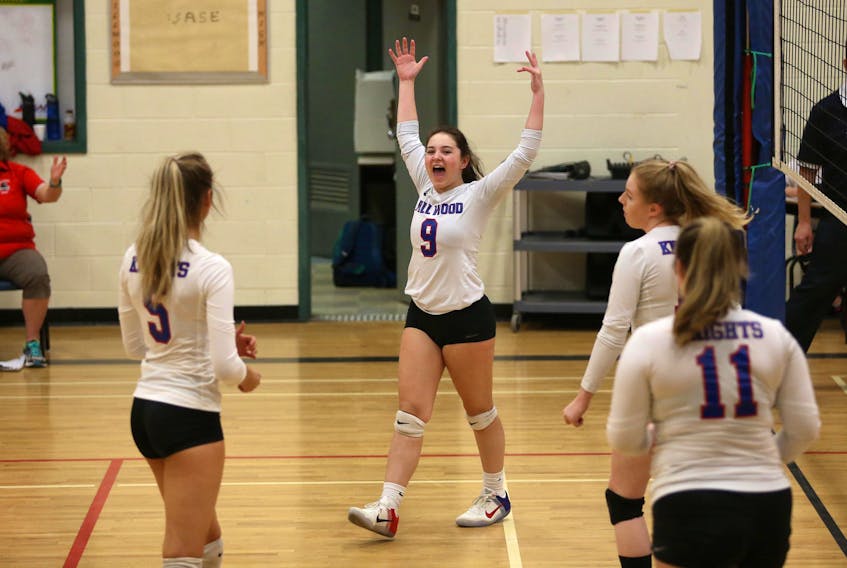 Millwood Knight's Makayla Drysdale (9) reacts after a big kill in the opening set against the   Auburn Drive Eagles in metro high school girls' volleyball action in Lower Sackville on Wednesday. Looking on are Olivia Day (5), Angelina Bevis and Kylie Simpson (11). The Knights won the match 3-2. Tim Krochak / The Chronicle Herald