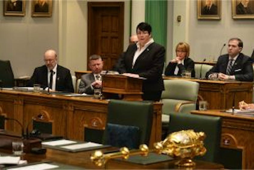 ['Finance Minister Cathy Bennett delivers the April budget in the House of Assembly.']