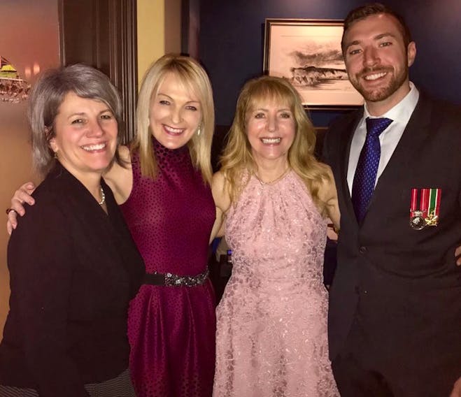 Sheila Miller (second from right) of St. John’s and her son, veteran Grant Miller (right), attended a dinner Saturday in St. John’s to help raise awareness for the True Patriot Love Foundation, a national charity that supports military families. They’re pictured with supporters Gail Wideman (left) and Glenda Ellis.