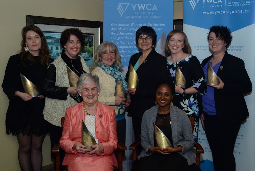 Award recipients (seated, from left) Mary Keiley (Lifetime Achievement) and Gobhina Nagarajah (Community and Social Development); (standing, from left) Joanna Barker (Young Woman of Distinction), Jennifer Deon (Arts and Culture), Kimberly Orren (Mentorship and Education), Sharon Warren (Public Affairs), Corina Walsh (Business) and Jennifer Crane (Wellness and Active Living).