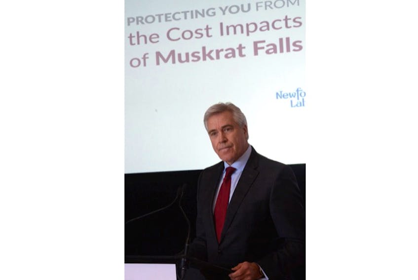 Premier Dwight Ball at an announcement Monday in the Confederation Building lobby about measures the provincial government plans to take to reduce electricity costs for ratepayers when the Muskrat Falls hydroelectric dam begins operating in 2021.