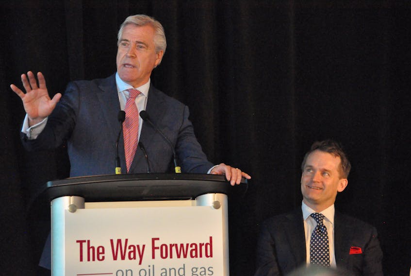 Premier Dwight Ball (left) speaks at an event Monday at The Rooms in St. John’s, while Liberal MP Seamus O’Regan looks on.