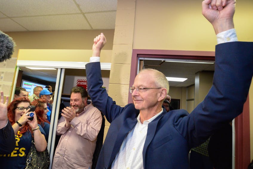 Progressive Conservative candidate Ches Crosbie signals victory to his supporters in the Windsor Lake byelection Thursday night at his campaign headquarters in St. John’s.