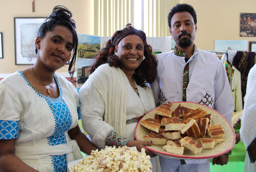 Eritrea, located in the Horn of Africa next to Sudan and Ethiopia, is a multi-ethnic country. Eritreans (from left) Awot, Tsehory and Smret showcased their version of popcorn and bread during the Association for New Canadians Multicultural Day celebration Wednesday at St. Pius X Church in St. John’s.